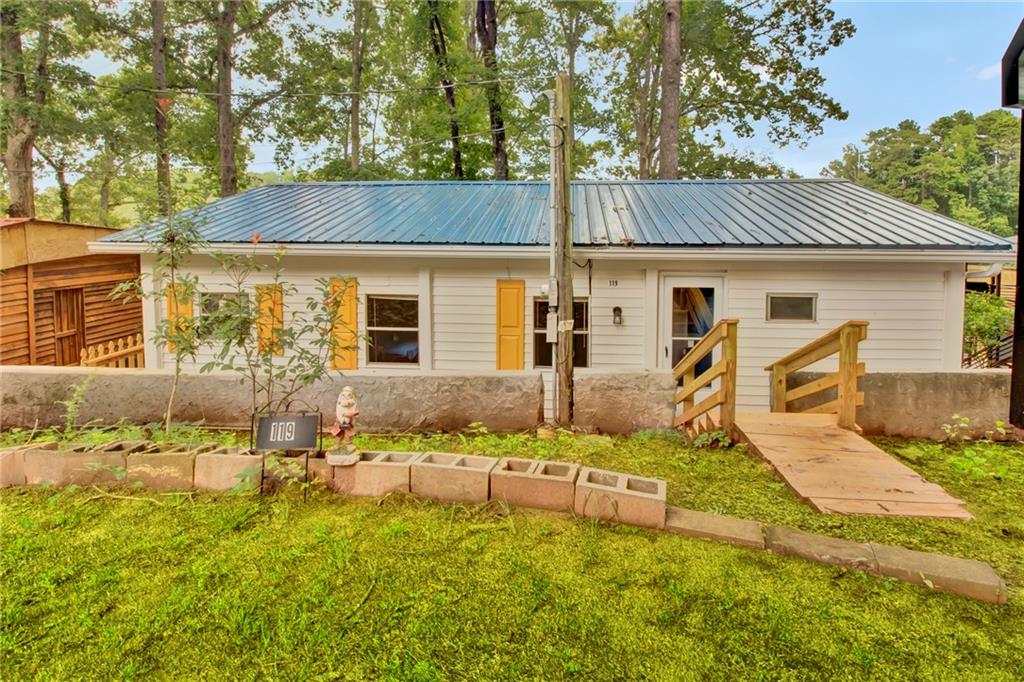 front view of a house with yard