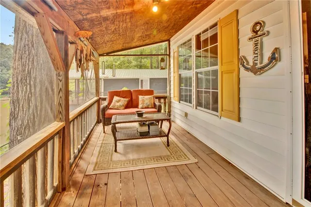 a balcony view with a seating space