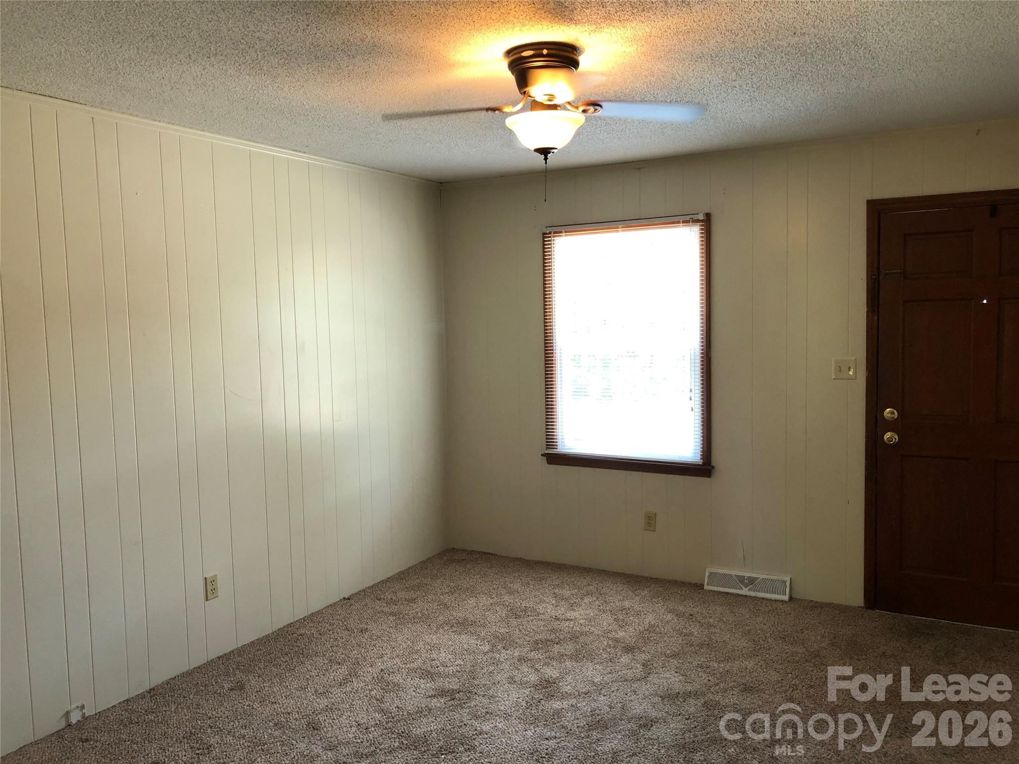1411 Roundtree Lane, Unit 132 Lincolnton, NC 28092 - Photo 2 of 7 an empty room with a window