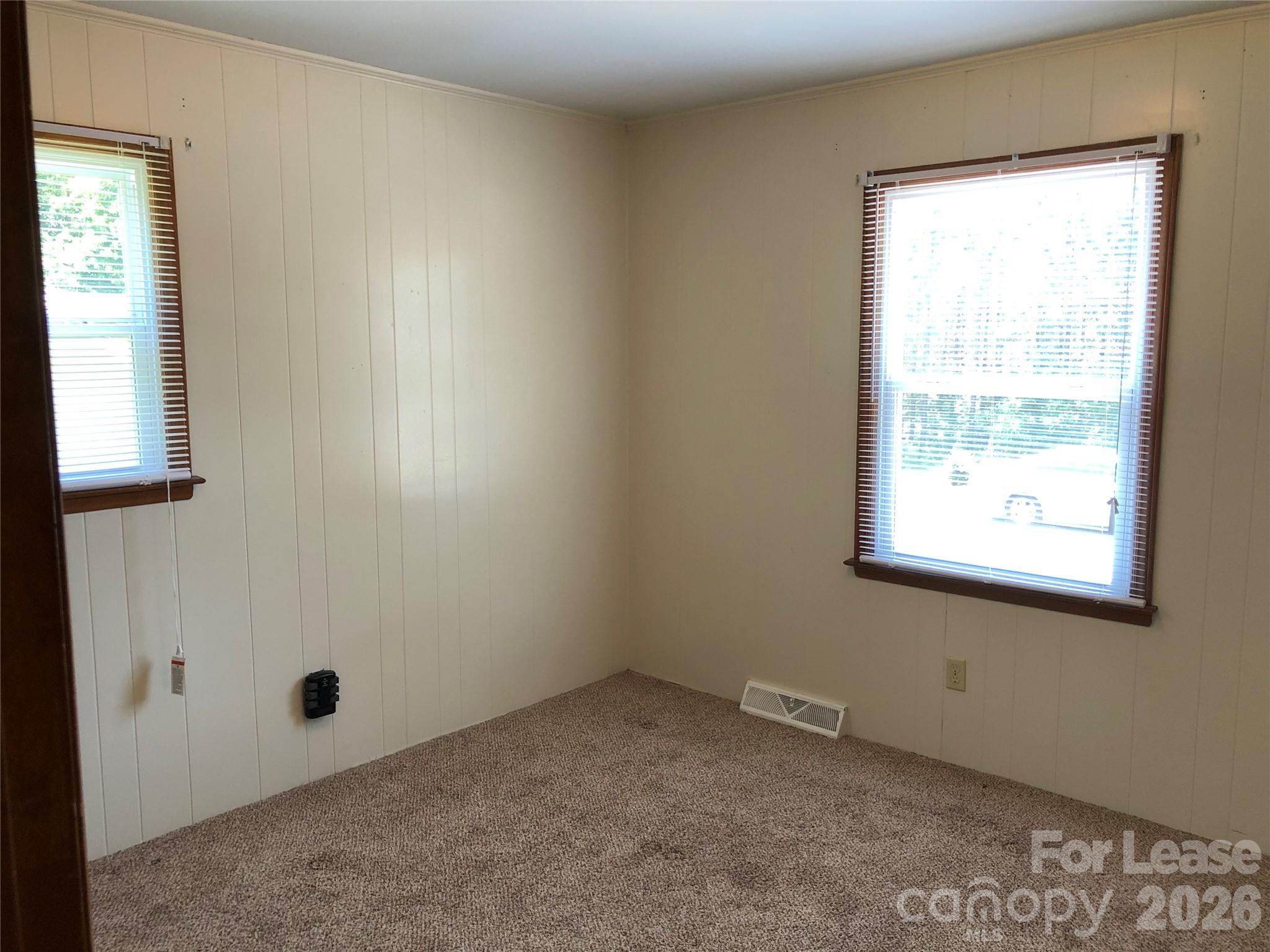 1411 Roundtree Lane, Unit 132 Lincolnton, NC 28092 - Photo 4 of 7 an empty room with a window