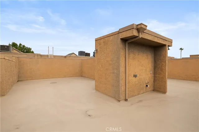 a bathroom with a granite countertop sink a large mirror and vanity