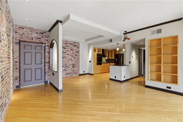 a view of a livingroom with a fireplace and furniture