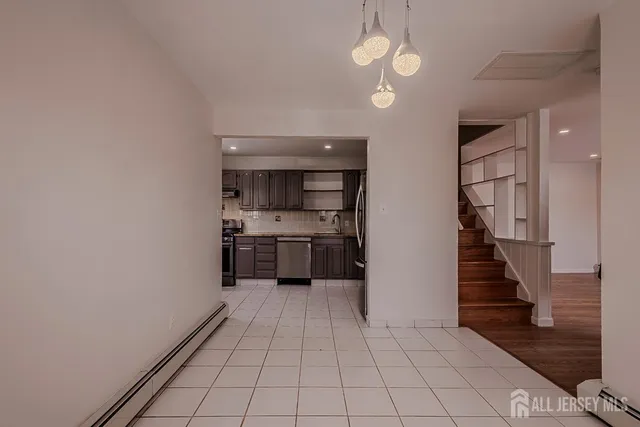 a view of a kitchen with a sink and dishwasher kitchen view
