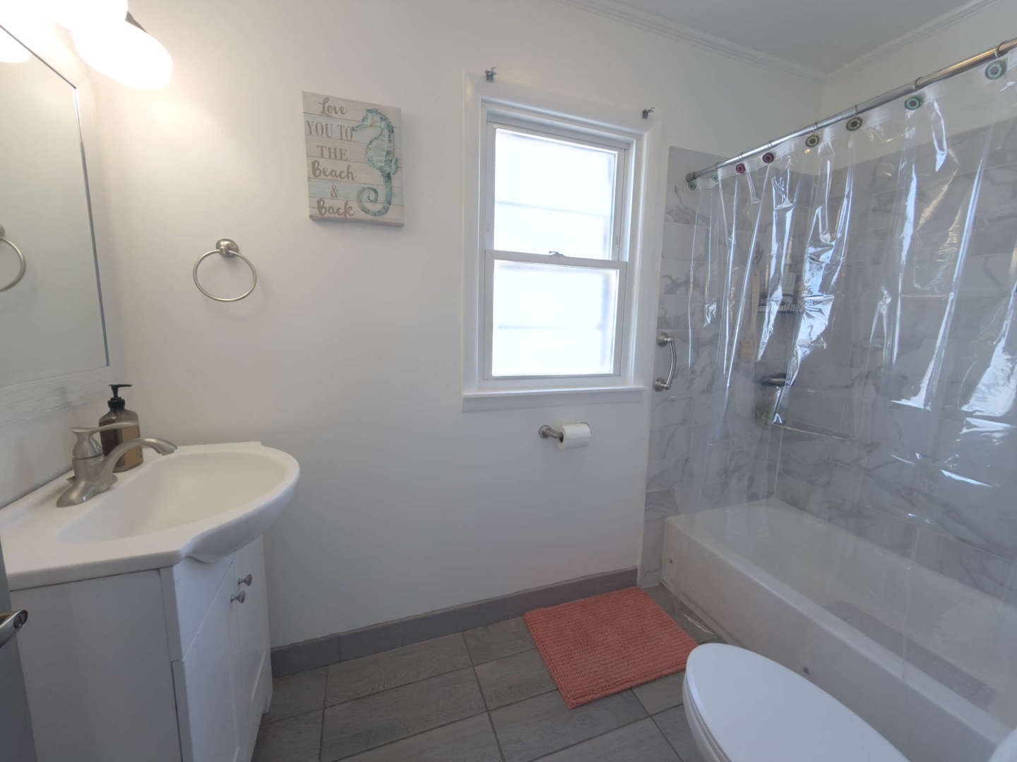 2035 Fargo Street Des Plaines, IL 60018 - Photo 11 of 19 a bathroom with a sink toilet and shower
