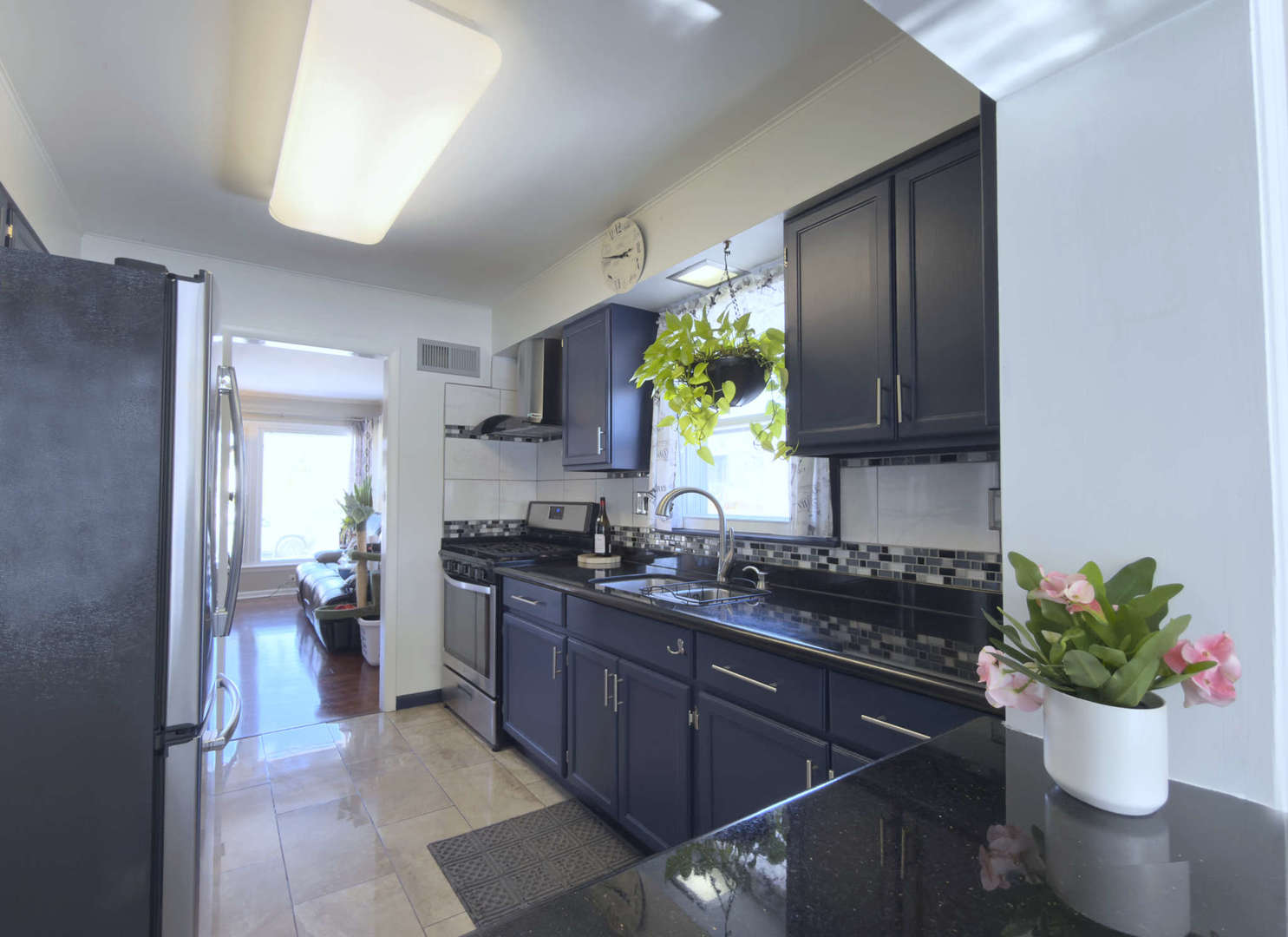 2035 Fargo Street Des Plaines, IL 60018 - Photo 13 of 19 a kitchen with a sink and cabinets