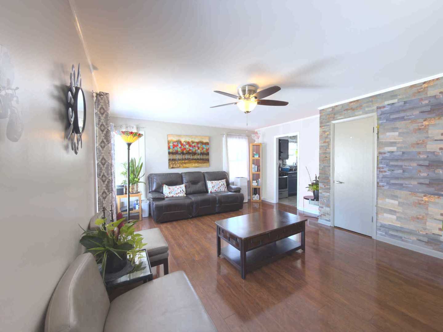 2035 Fargo Street Des Plaines, IL 60018 - Photo 5 of 19 a living room with furniture and a table
