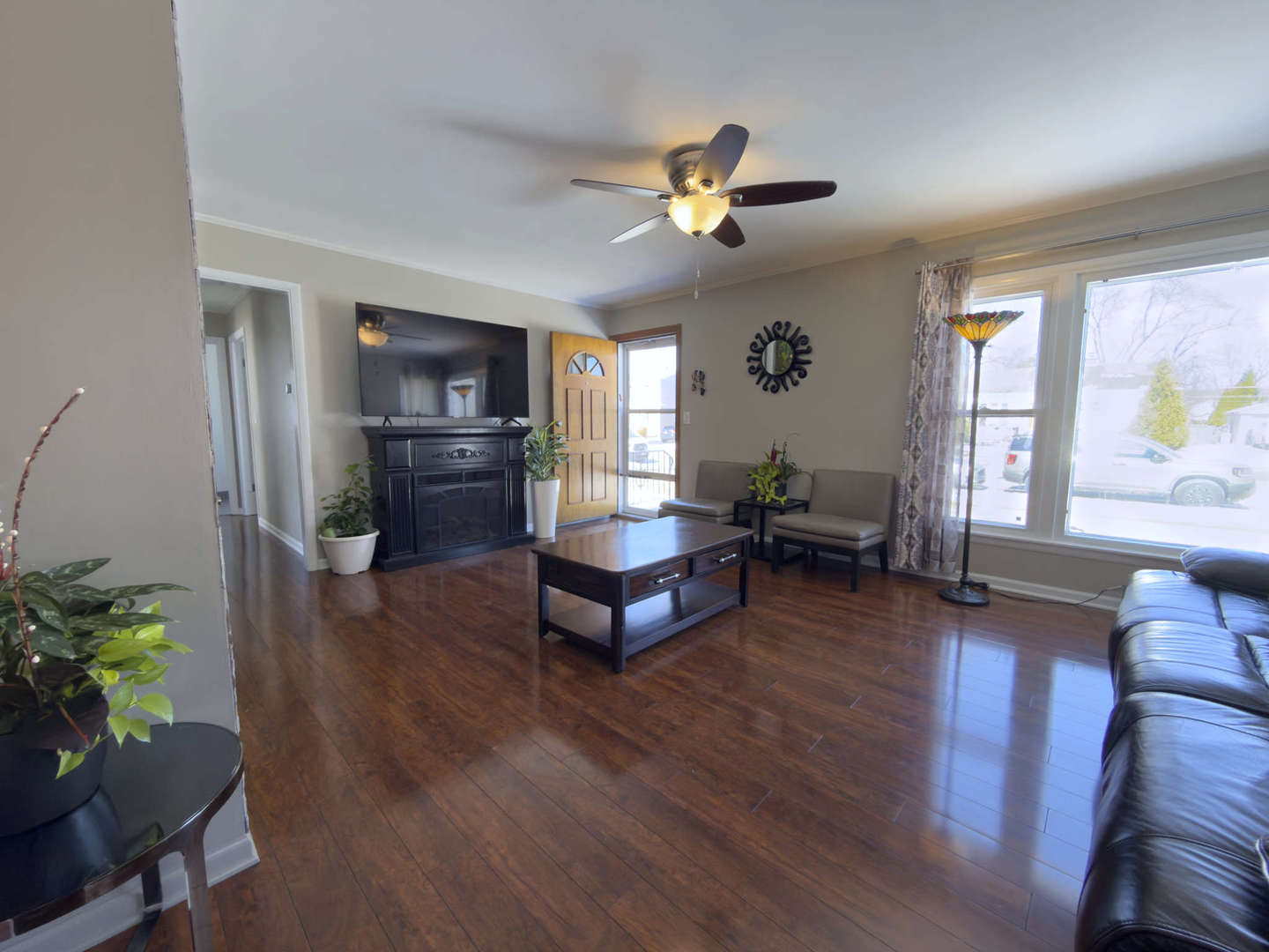 2035 Fargo Street Des Plaines, IL 60018 - Photo 6 of 19 a living room with furniture wooden floor and a window