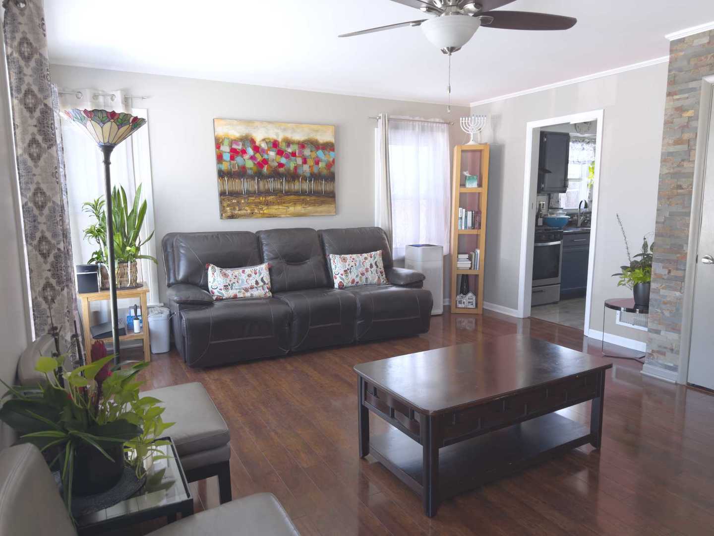 2035 Fargo Street Des Plaines, IL 60018 - Photo 7 of 19 a living room with furniture and a potted plant