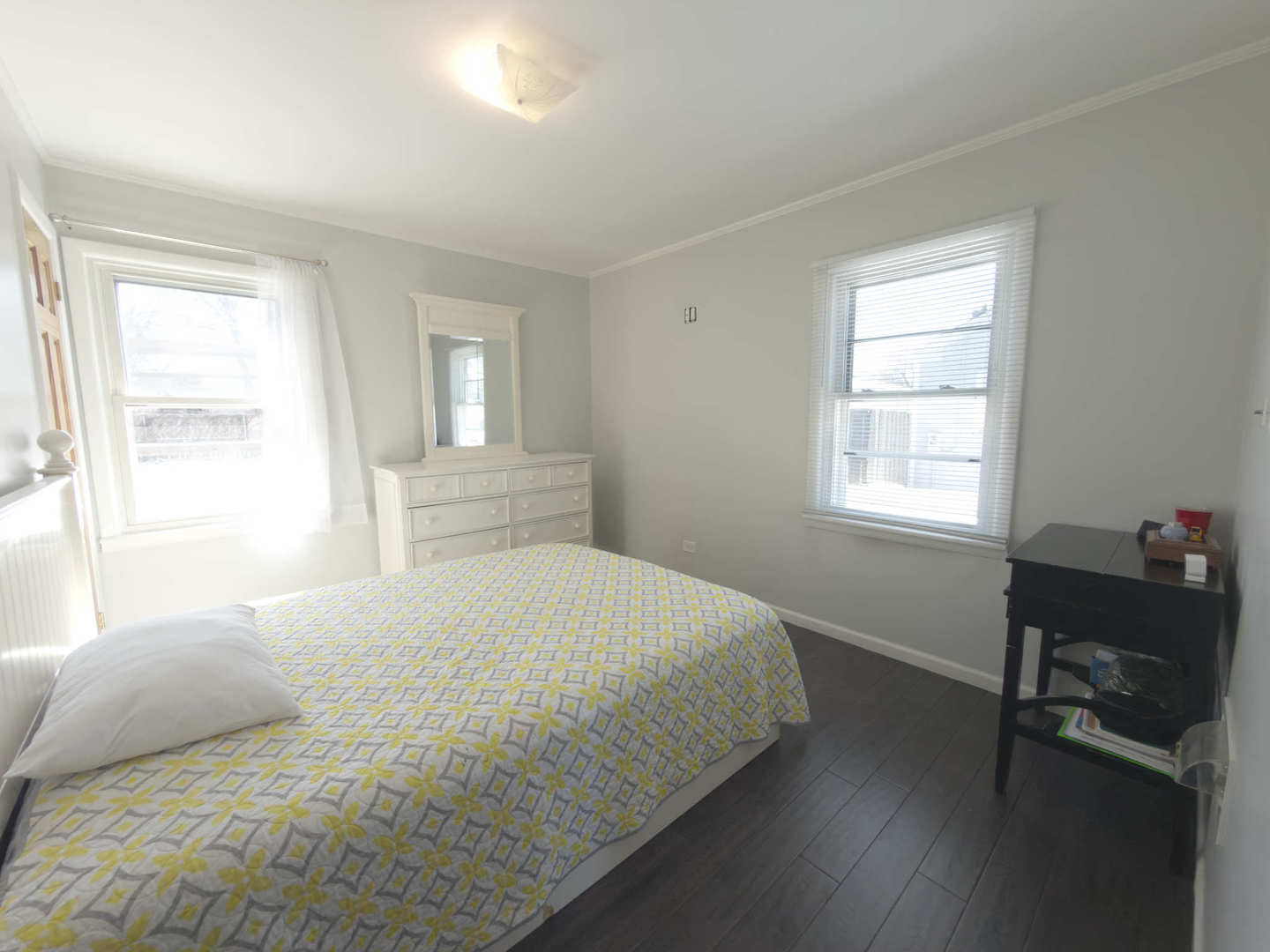 2035 Fargo Street Des Plaines, IL 60018 - Photo 8 of 19 a bedroom with a bed and a window