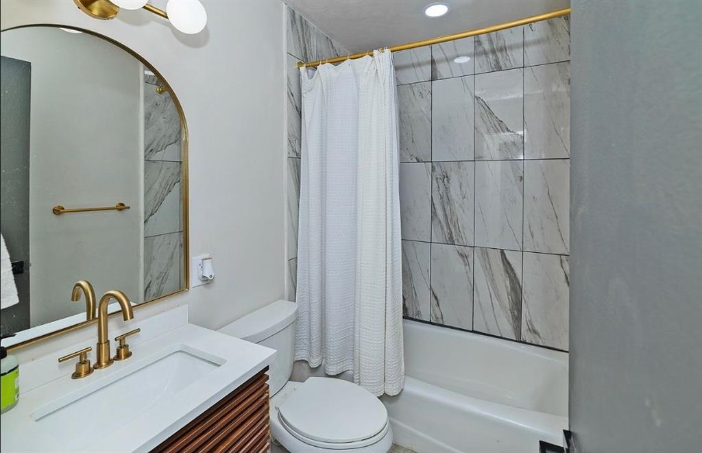 3807 Greenhill Drive Chamblee, GA 30341 - Photo 13 of 23 a bathroom with a sink toilet and shower