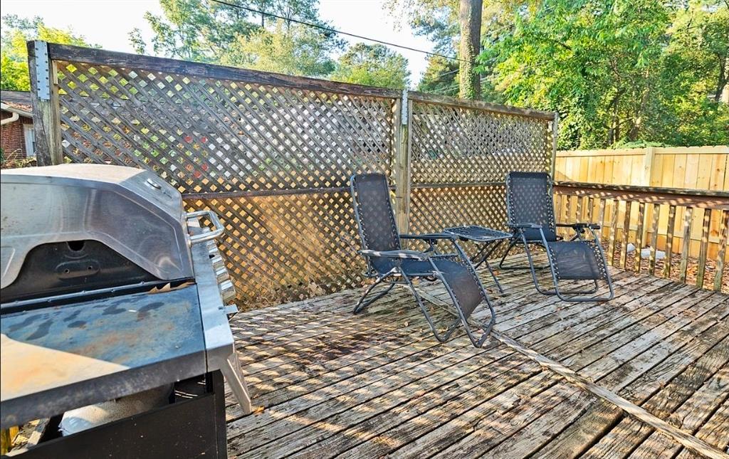 3807 Greenhill Drive Chamblee, GA 30341 - Photo 20 of 23 a view of a wooden deck with a bench