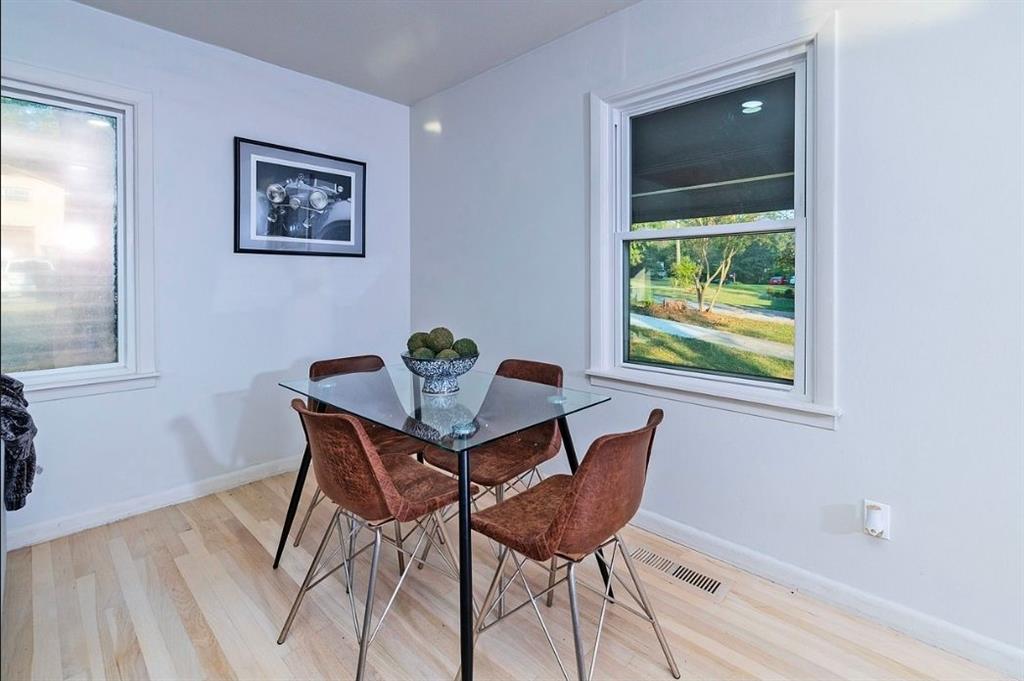 3807 Greenhill Drive Chamblee, GA 30341 - Photo 3 of 23 a view of a dining room with furniture and a window