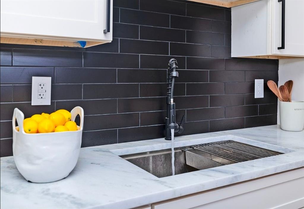 3807 Greenhill Drive Chamblee, GA 30341 - Photo 4 of 23 a view of a sink and dishwasher with wooden floor