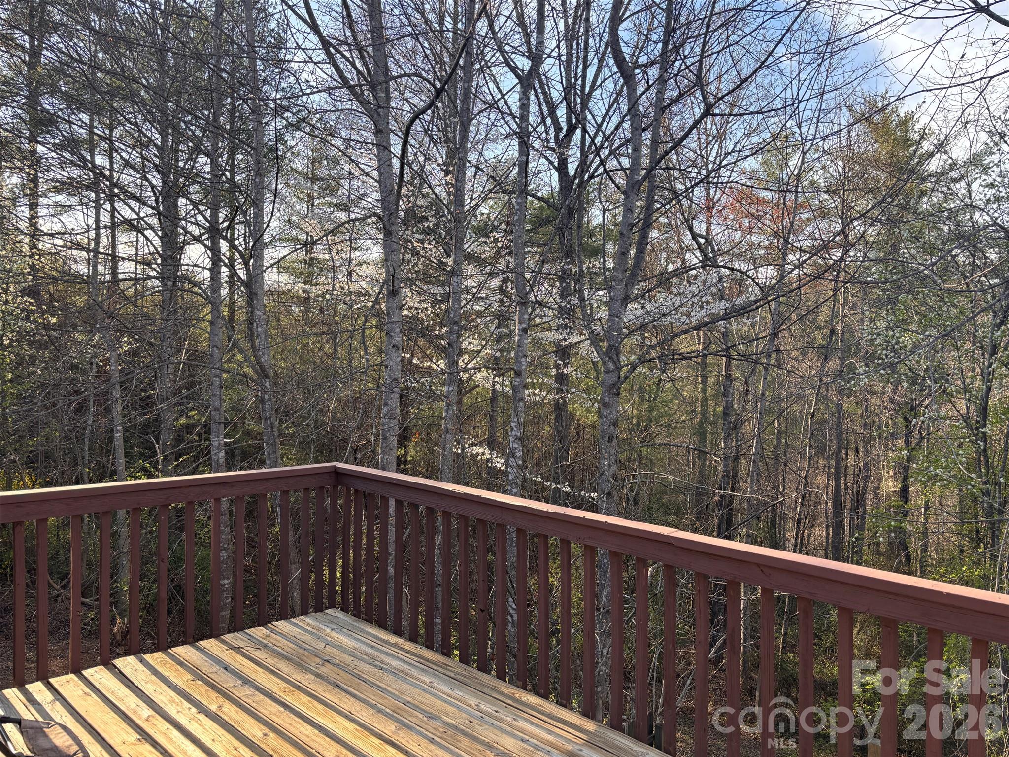 5164 Ralph Winchester Road Lenoir, NC 28645 - Photo 18 of 20 a wooden deck with trees in front of it