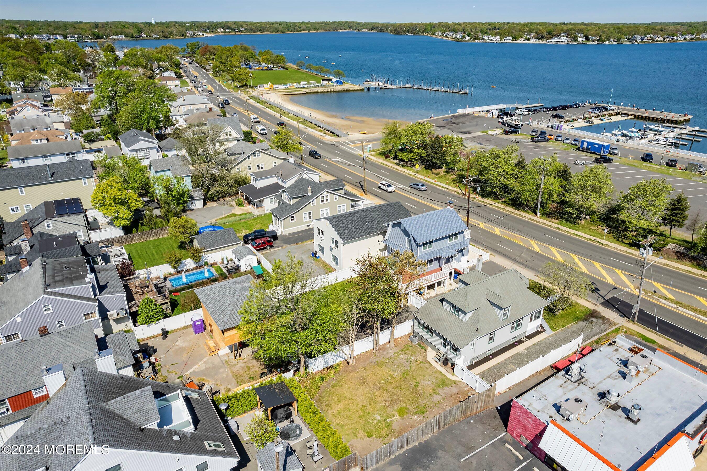 1202 River Road Belmar, NJ 07719 - Photo 31 of 32 an aerial view of a house with a swimming pool