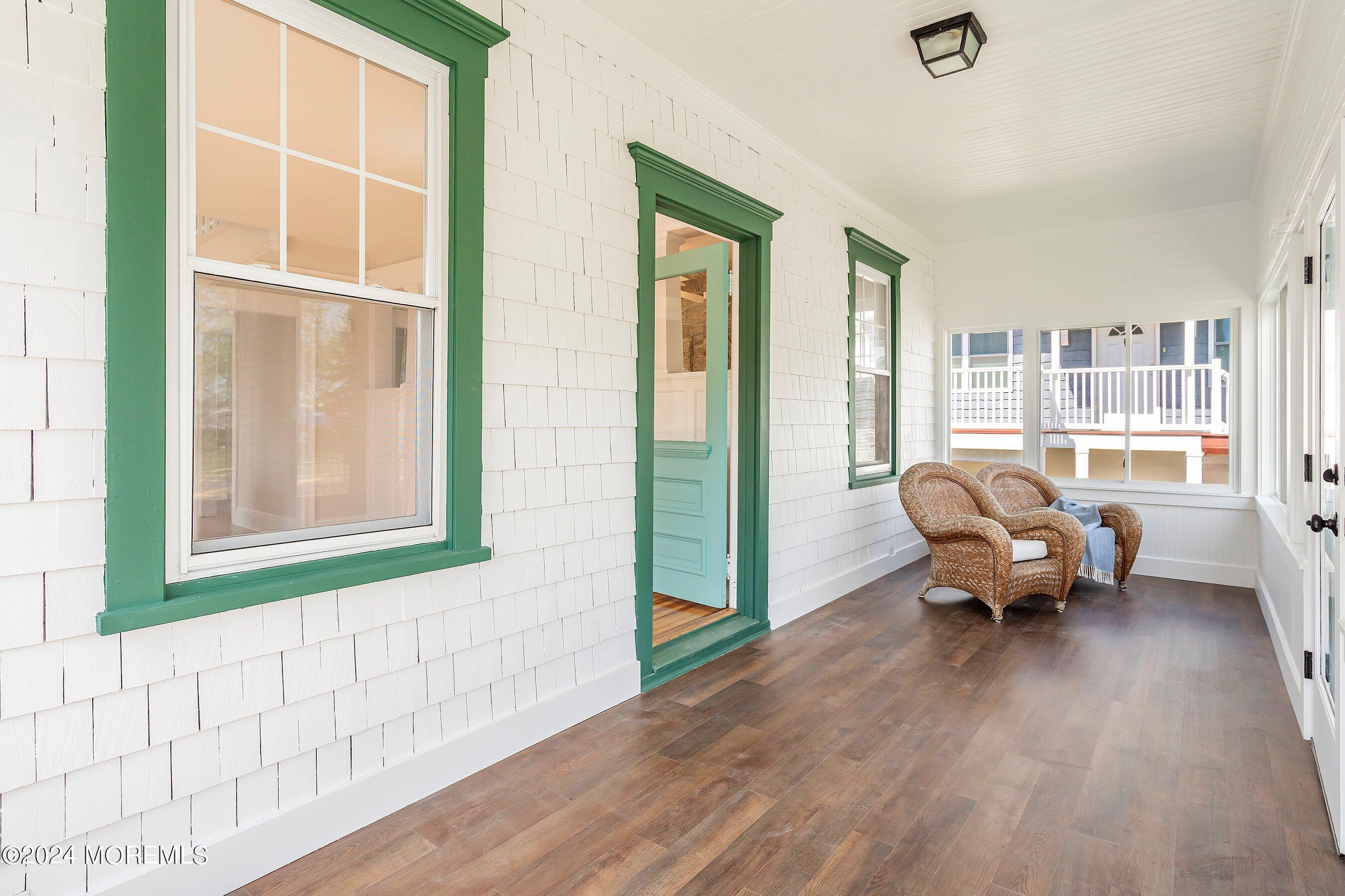 1202 River Road Belmar, NJ 07719 - Photo 7 of 32 a living room with furniture and a window