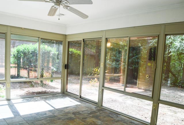 991 Plantation Creek Road Fortson, GA 31808 - Photo 34 of 43 Large sliding door in sunroom