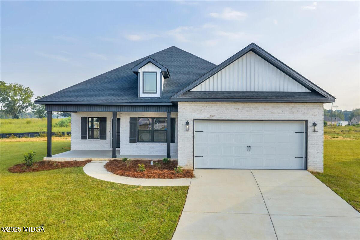 200 Eric Court Byron, GA 31008 - Photo 2 of 58 a front view of a house with a yard