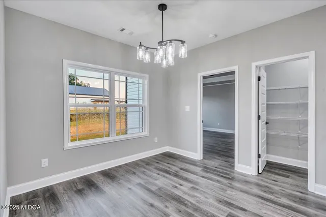 a view of a room with racks on the wall