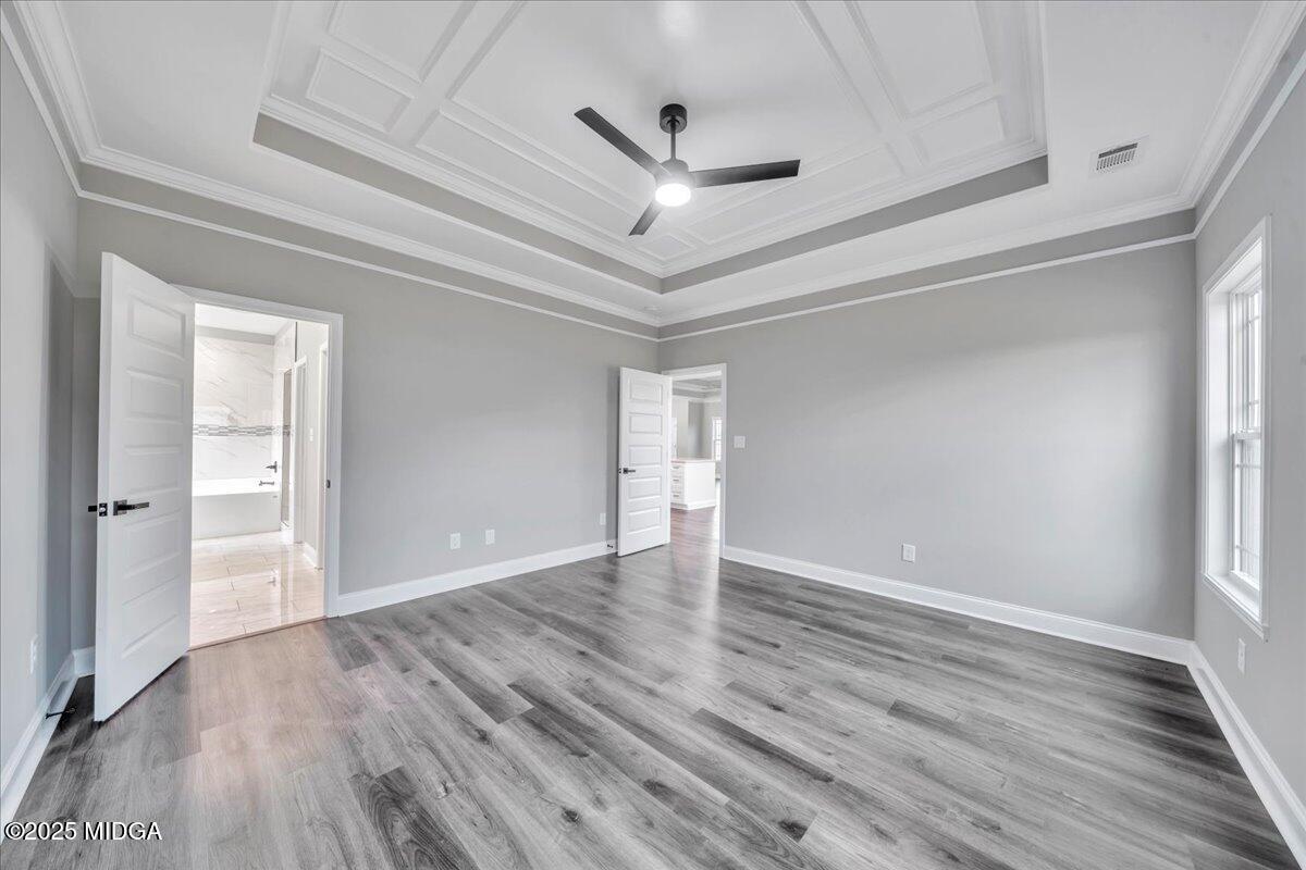 200 Eric Court Byron, GA 31008 - Photo 32 of 58 wooden floor in an empty room with a window