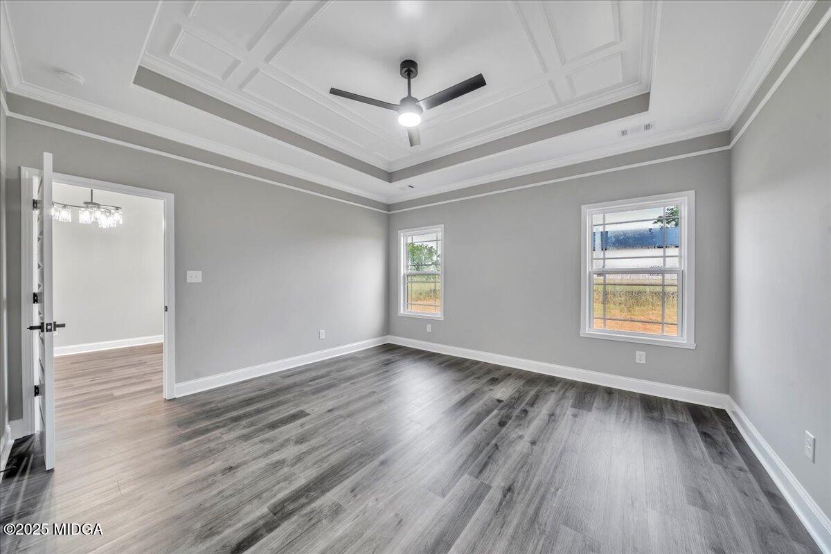 200 Eric Court Byron, GA 31008 - Photo 33 of 58 wooden floor in an empty room with a window