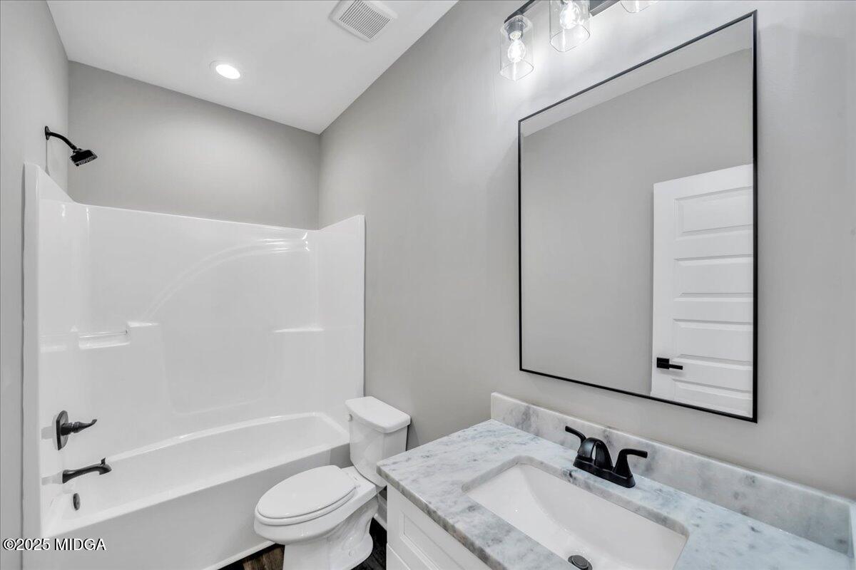 200 Eric Court Byron, GA 31008 - Photo 46 of 58 a bathroom with a sink a toilet and shower