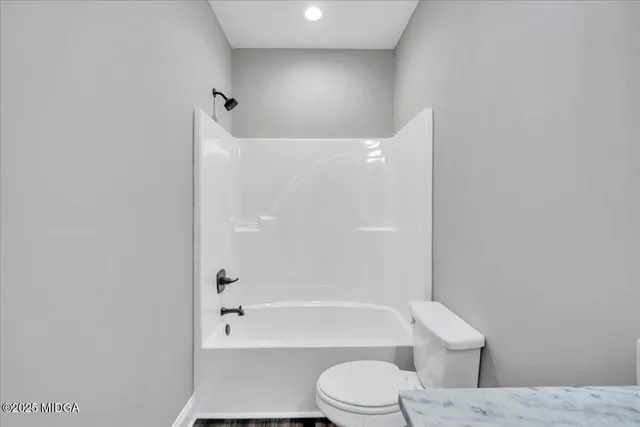 a view of a street with a building in the background