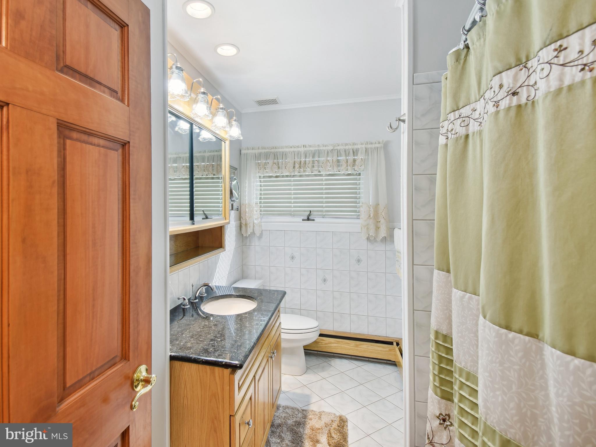 7 Round Hill Road Levittown, PA 19056 - Photo 31 of 68 Hall bath
Main level