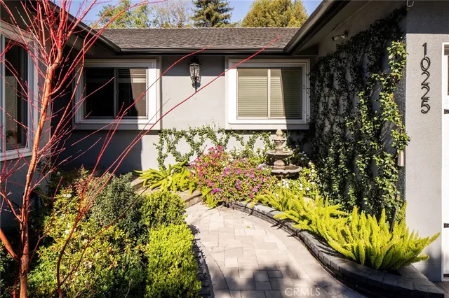 a house with a flower garden