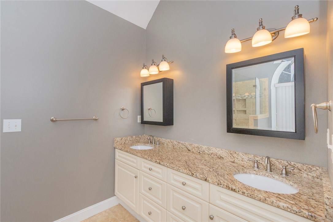 105 Sycamore Drive Clemson, SC 29631 - Photo 25 of 35 This bathroom features dual vanities, offering both comfort and practicality.