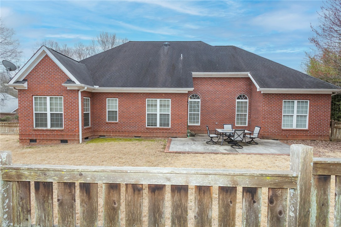 105 Sycamore Drive Clemson, SC 29631 - Photo 27 of 35 This classic brick residence features an expansive backyard with a comfortable patio.