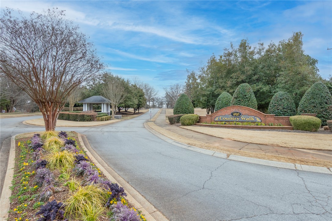 105 Sycamore Drive Clemson, SC 29631 - Photo 3 of 35 This community entrance welcomes you with lush landscaping and charming architectural details.