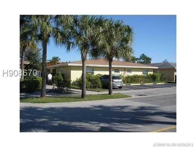 a view of a yard in front of a house