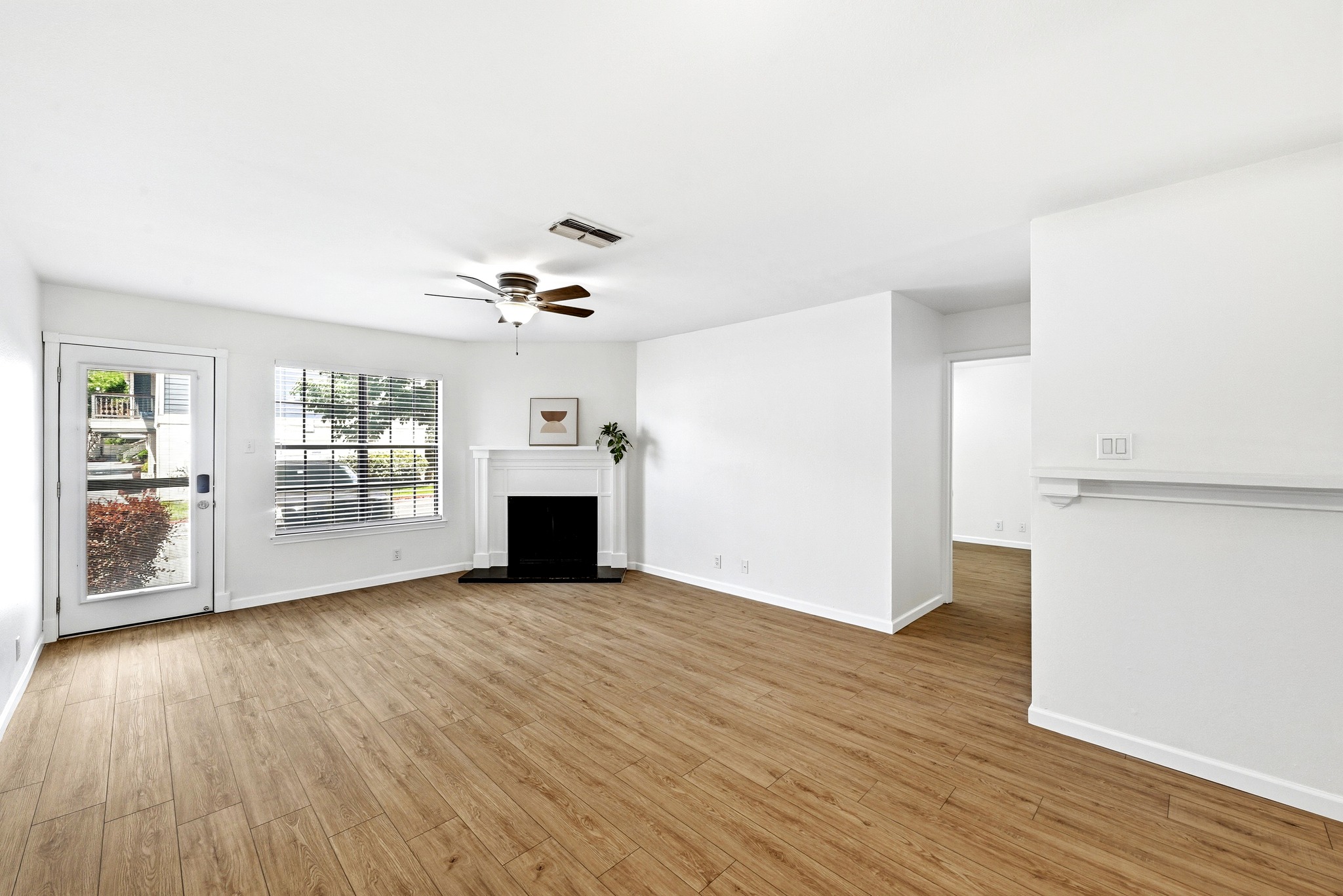 2215 Post Road, Unit 1026 Austin, TX 78704 - Photo 13 of 29 Open living/dining area