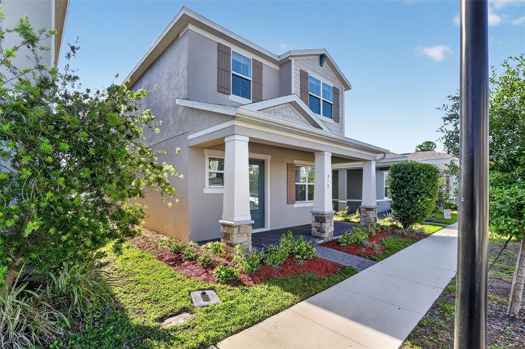 810 MIDDLETON Street DeBary, FL 32713 - Photo 2 of 52 front view of house with a yard