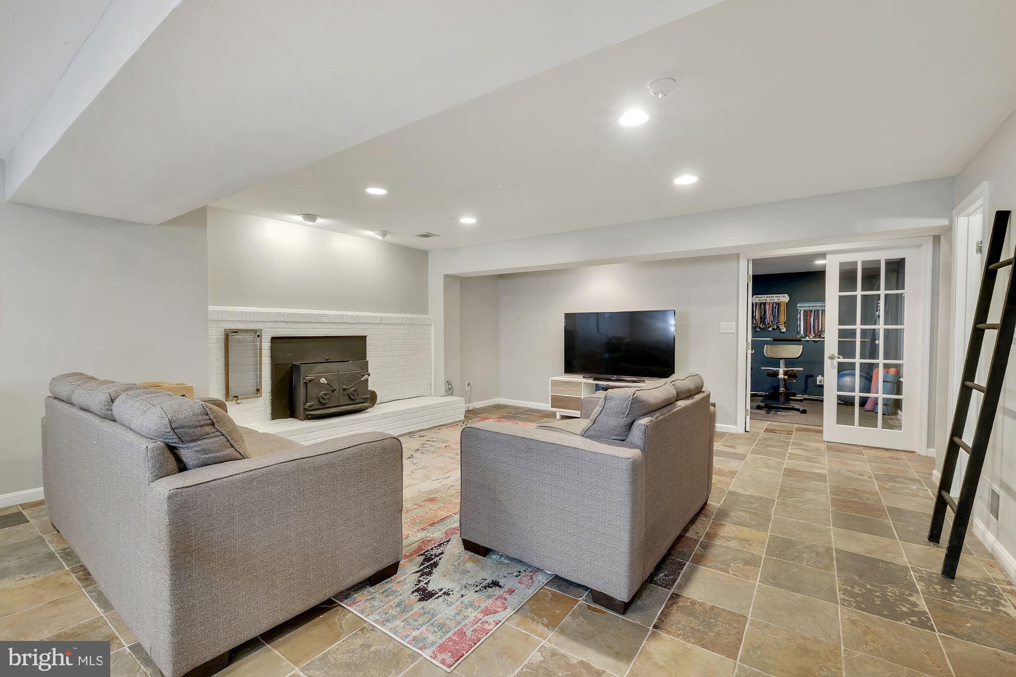 224 Rolling Road Gaithersburg, MD 20877 - Photo 22 of 35 Lower level Recreation Room