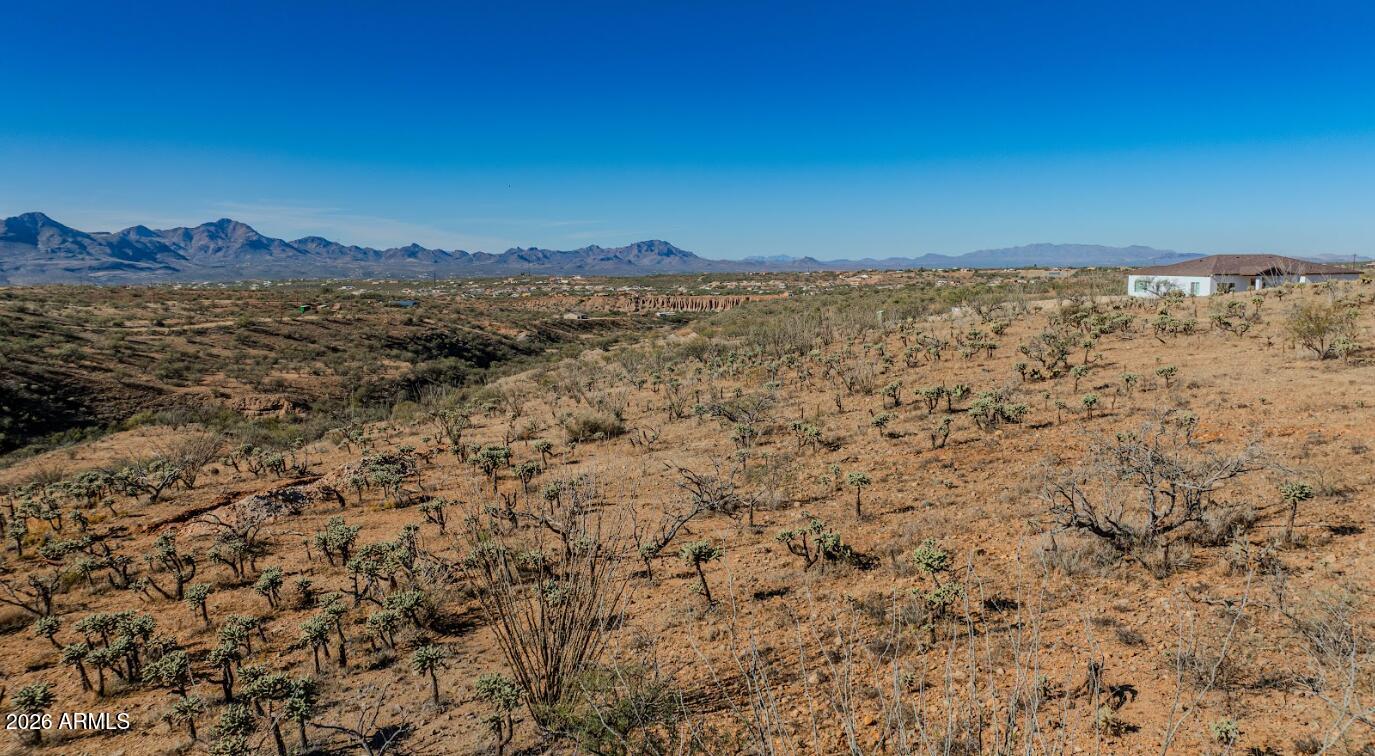338 Anfibio Court, Unit 79 Rio Rico, AZ 85648 - Photo 4 of 13 a view of a large body of water with a building in the background