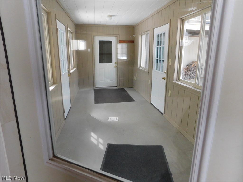 381 Lance Road Davisville, WV 26142 - Photo 25 of 34 I refer to this as the breezeway. From the 2 car attached garage you would enter into the home from all elements of the weather and have easy access for carrying in groceries, etc.