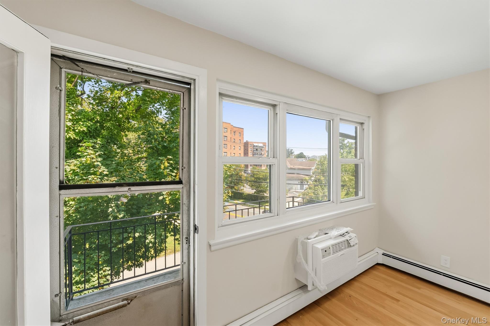 665 Pelham Road, Unit A15 New Rochelle, NY 10805 - Photo 18 of 33 Corner balcony directly off of living room