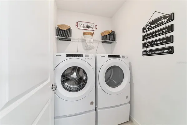 a view of two chairs in patio