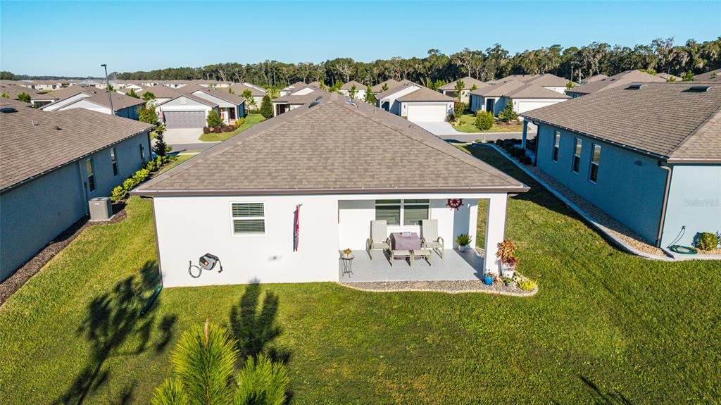 8392 Southwest 54th Street Ocala, FL 34481 - Photo 35 of 59 an aerial view of a house with swimming pool and patio