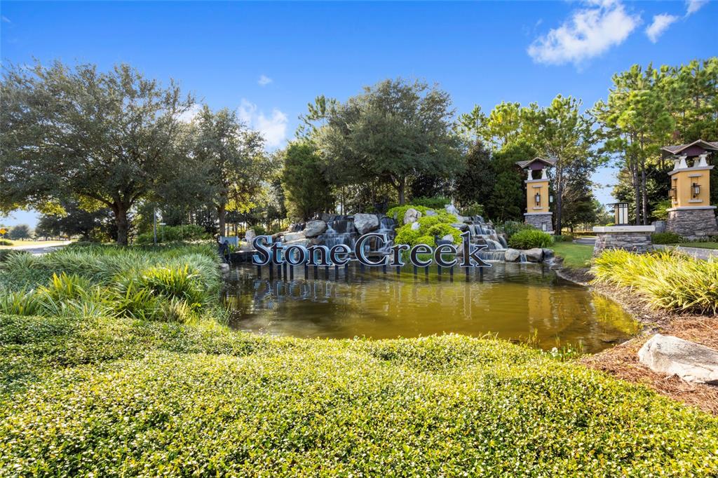 8392 Southwest 54th Street Ocala, FL 34481 - Photo 44 of 59 a view of a swimming pool with a table and chairs