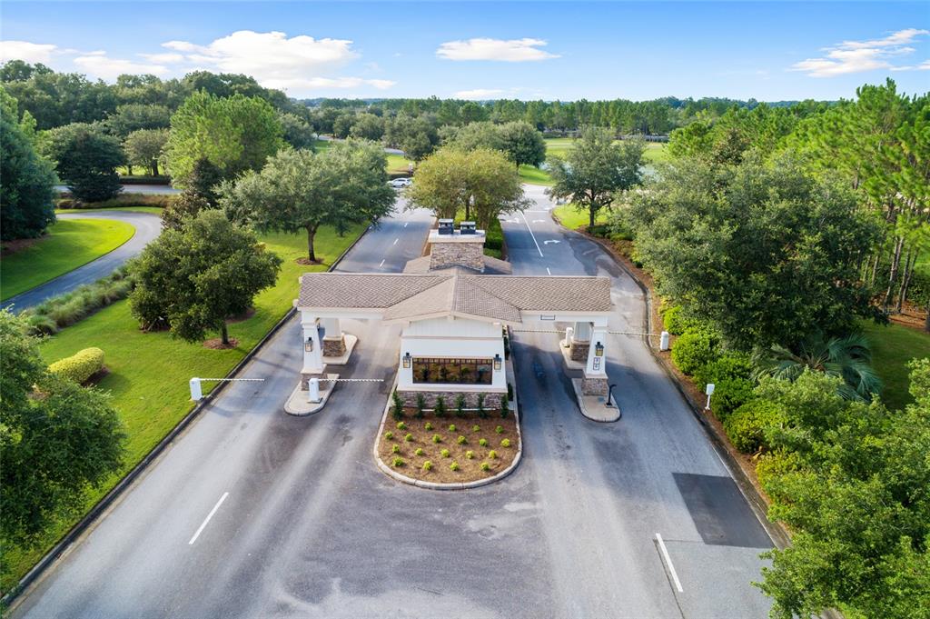 8392 Southwest 54th Street Ocala, FL 34481 - Photo 45 of 59 an aerial view of a house with swimming pool patio and outdoor seating