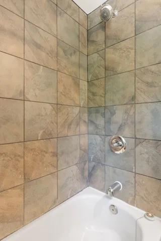 a bathroom with a bathtub