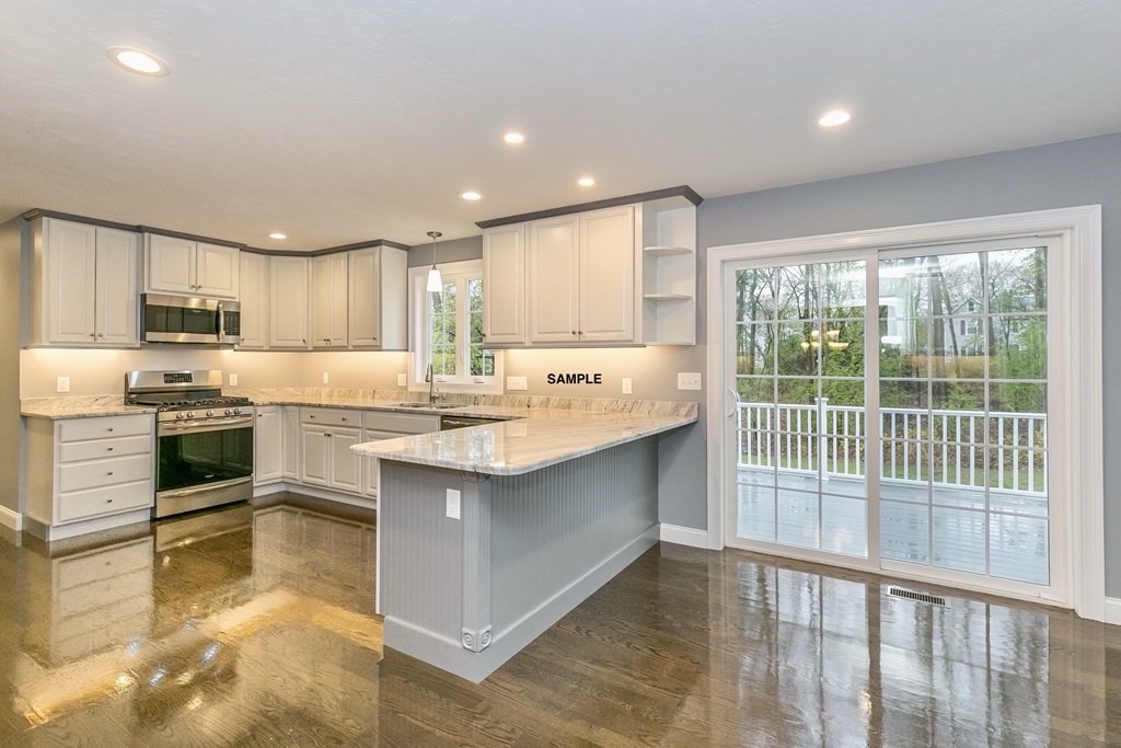 6 Shawsheen Road Billerica, MA 01821 - Photo 3 of 8 a kitchen with counter top space cabinets and appliances