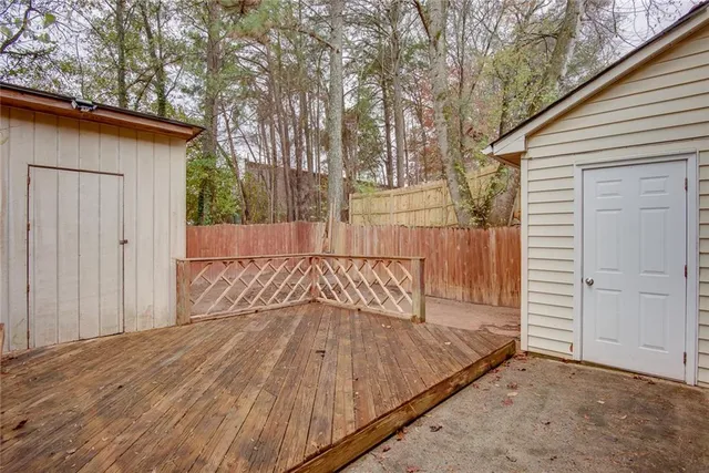 a view of wooden floor in front of house