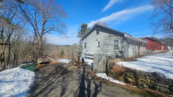 a view of a house with a snow