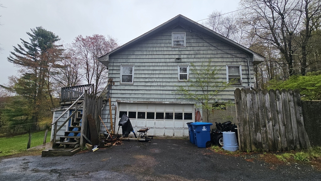 84 Stafford Holland Road Wales, MA 01081 - Photo 8 of 10 a view of a house with a yard