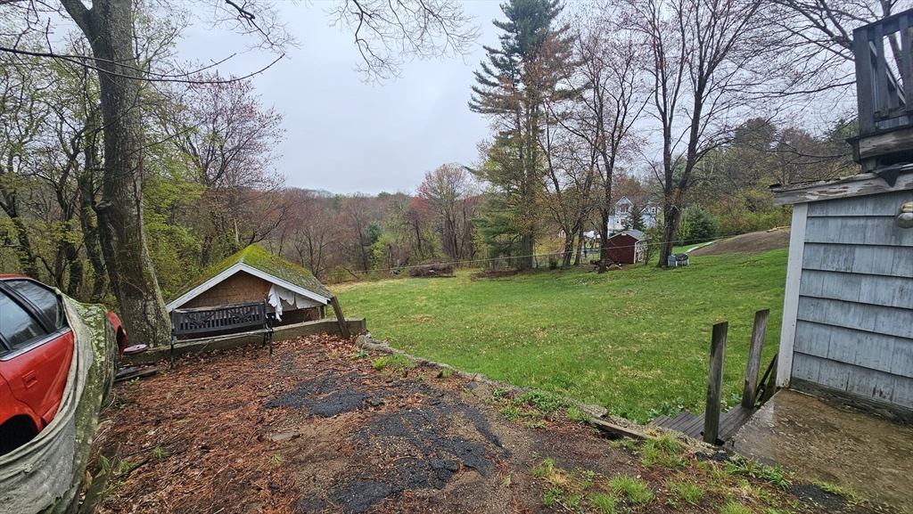 84 Stafford Holland Road Wales, MA 01081 - Photo 10 of 10 a view of backyard with green space