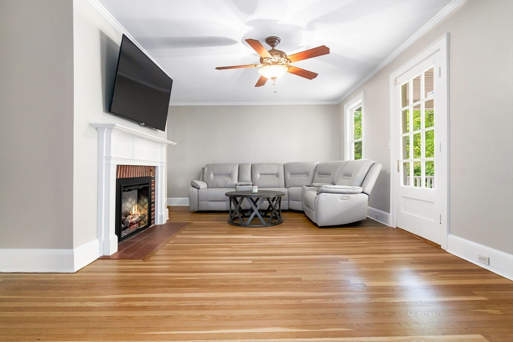 4 Valley Road Danvers, MA 01923 - Photo 14 of 42 a living room with furniture and a fireplace